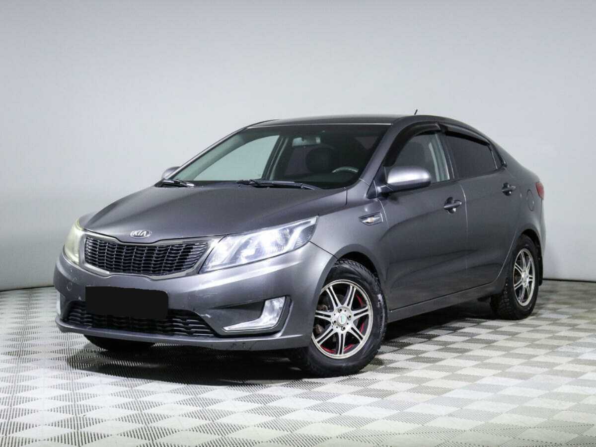 Kia Rio с пробегом — 2013 год. Фото: #0