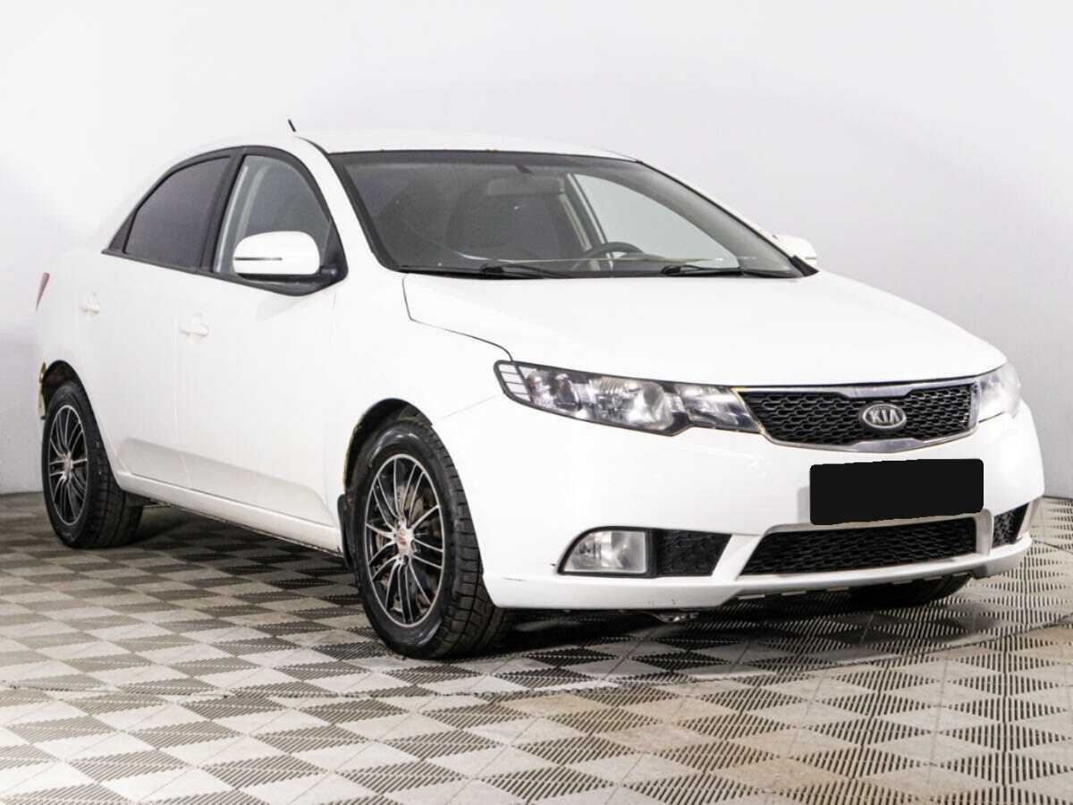 Kia Cerato с пробегом — 2012 год. Фото: #2