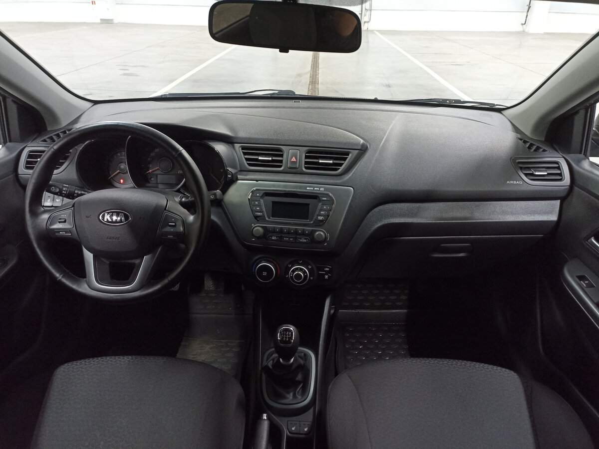 Kia Rio с пробегом — 2013 год. Фото: #13