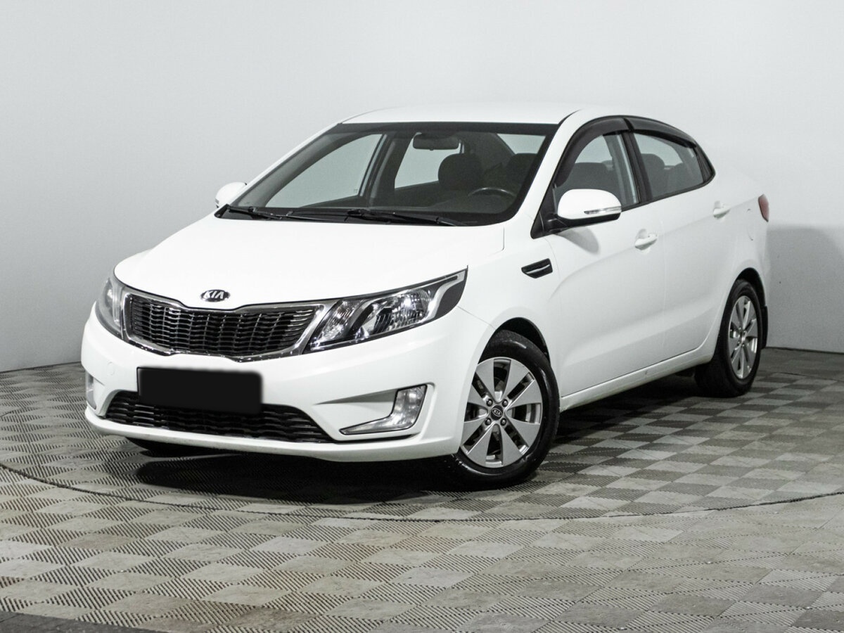 Kia Rio с пробегом — 2013 год. Фото: #0