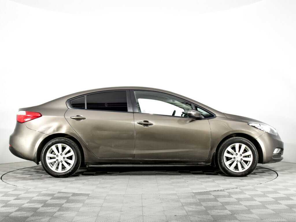 Kia Cerato с пробегом — 2015 год. Фото: #3