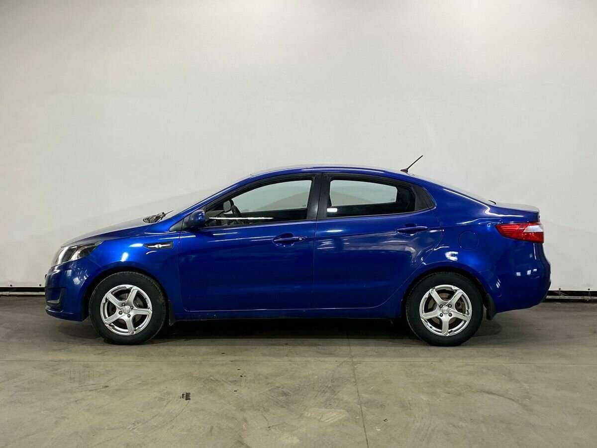 Kia Rio с пробегом — 2013 год. Фото: #7