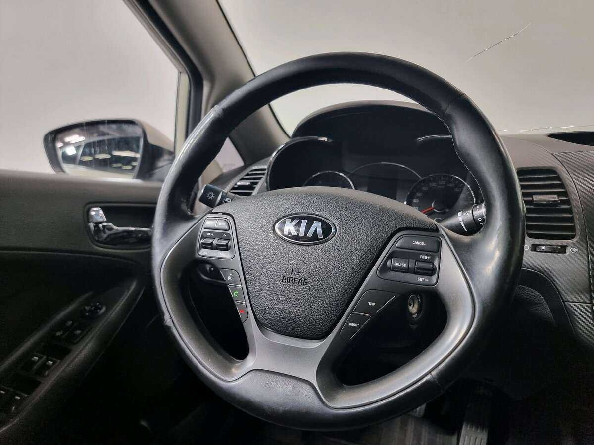 Kia Cerato с пробегом — 2014 год. Фото: #10