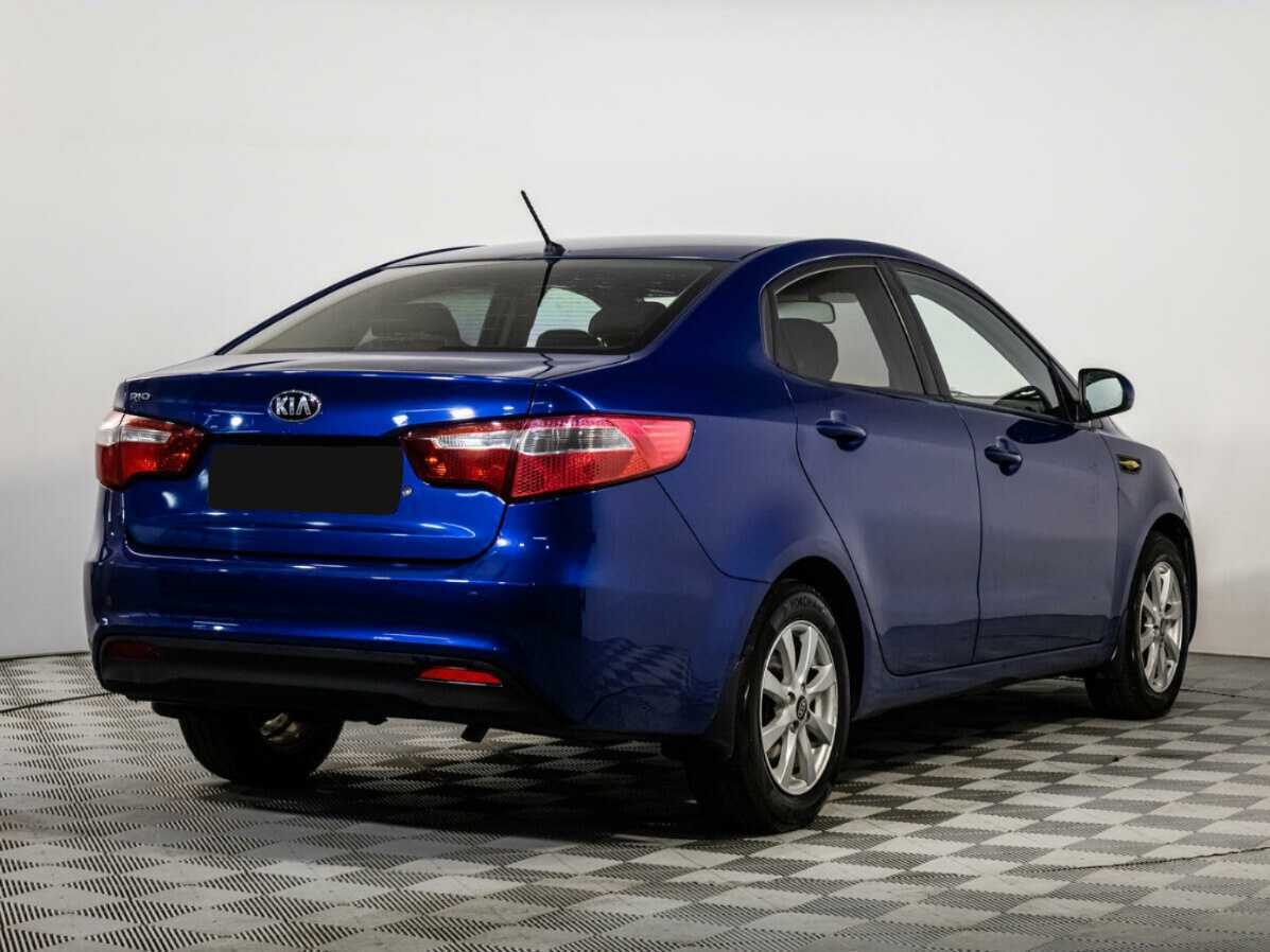 Kia Rio с пробегом — 2013 год. Фото: #3