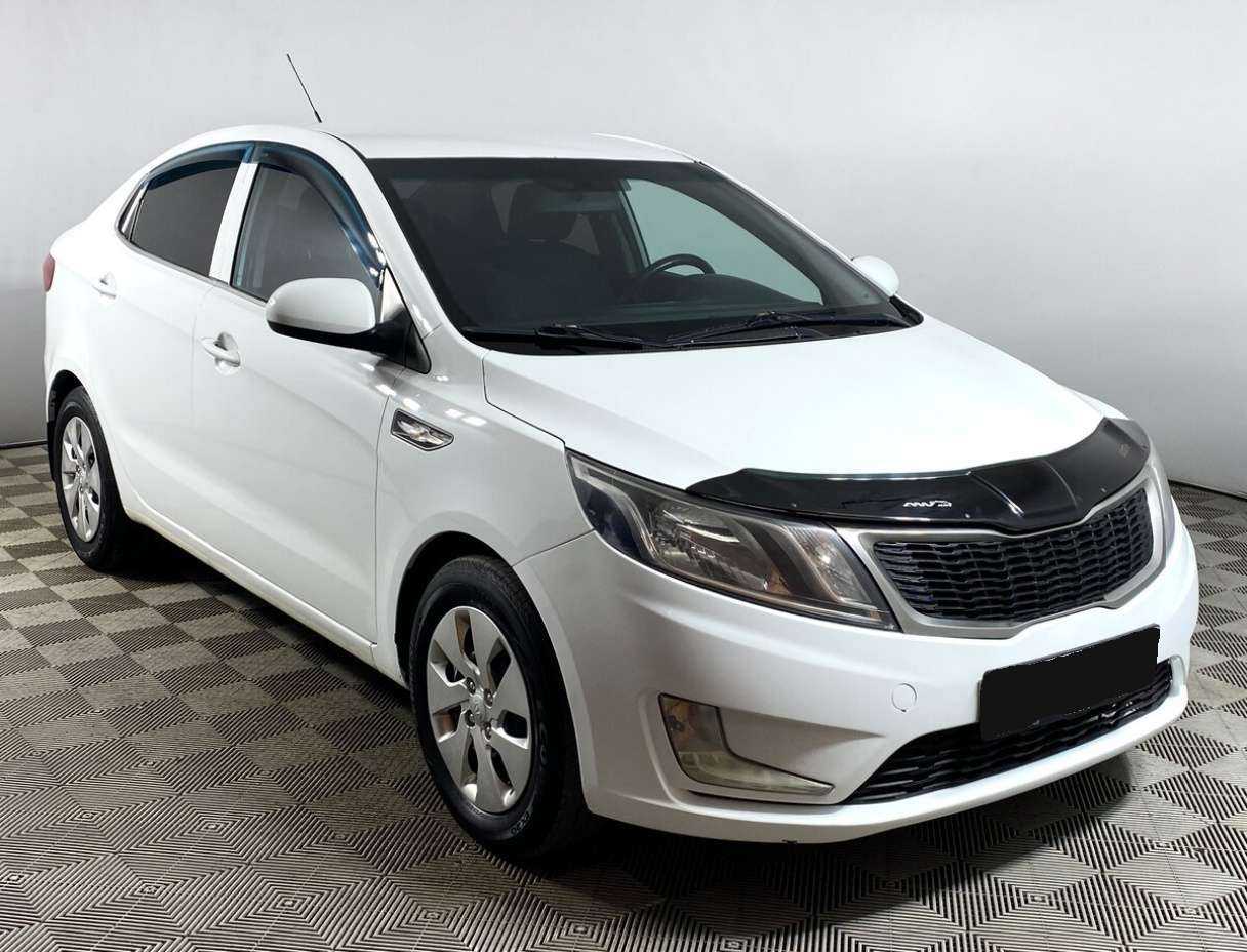 Kia Rio с пробегом — 2014 год. Фото: #2
