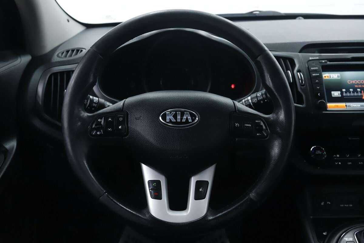 Kia Sportage с пробегом — 2013 год. Фото: #12