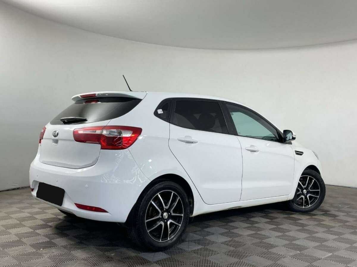 Kia Rio с пробегом — 2013 год. Фото: #5