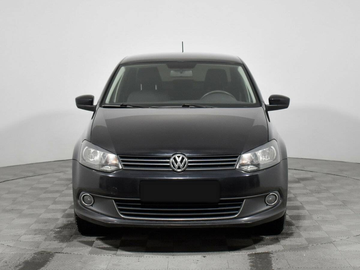 Volkswagen Polo с пробегом — 2013 год. Фото: #1