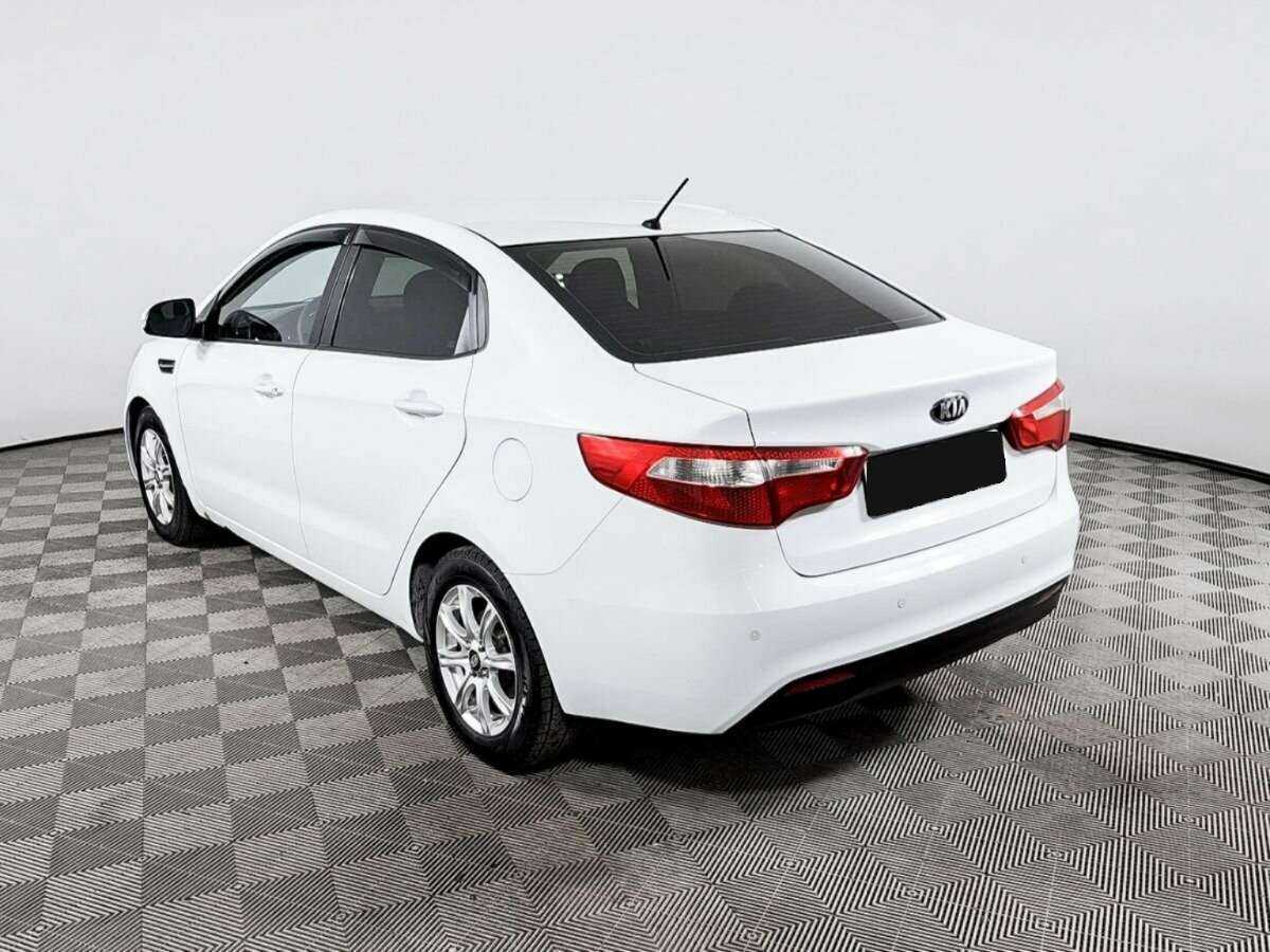 Kia Rio с пробегом — 2013 год. Фото: #6