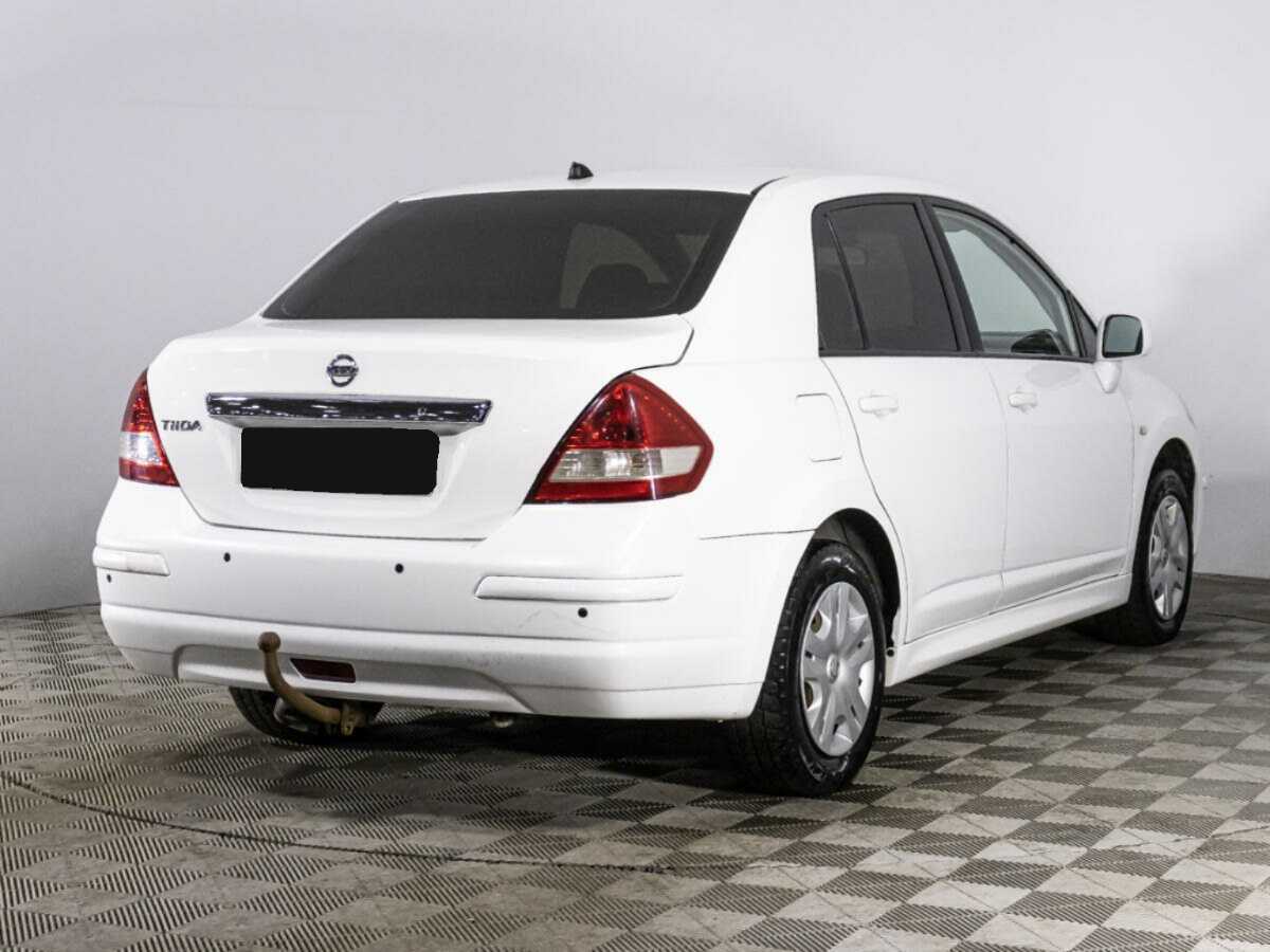 Nissan Tiida с пробегом — 2013 год. Фото: #4