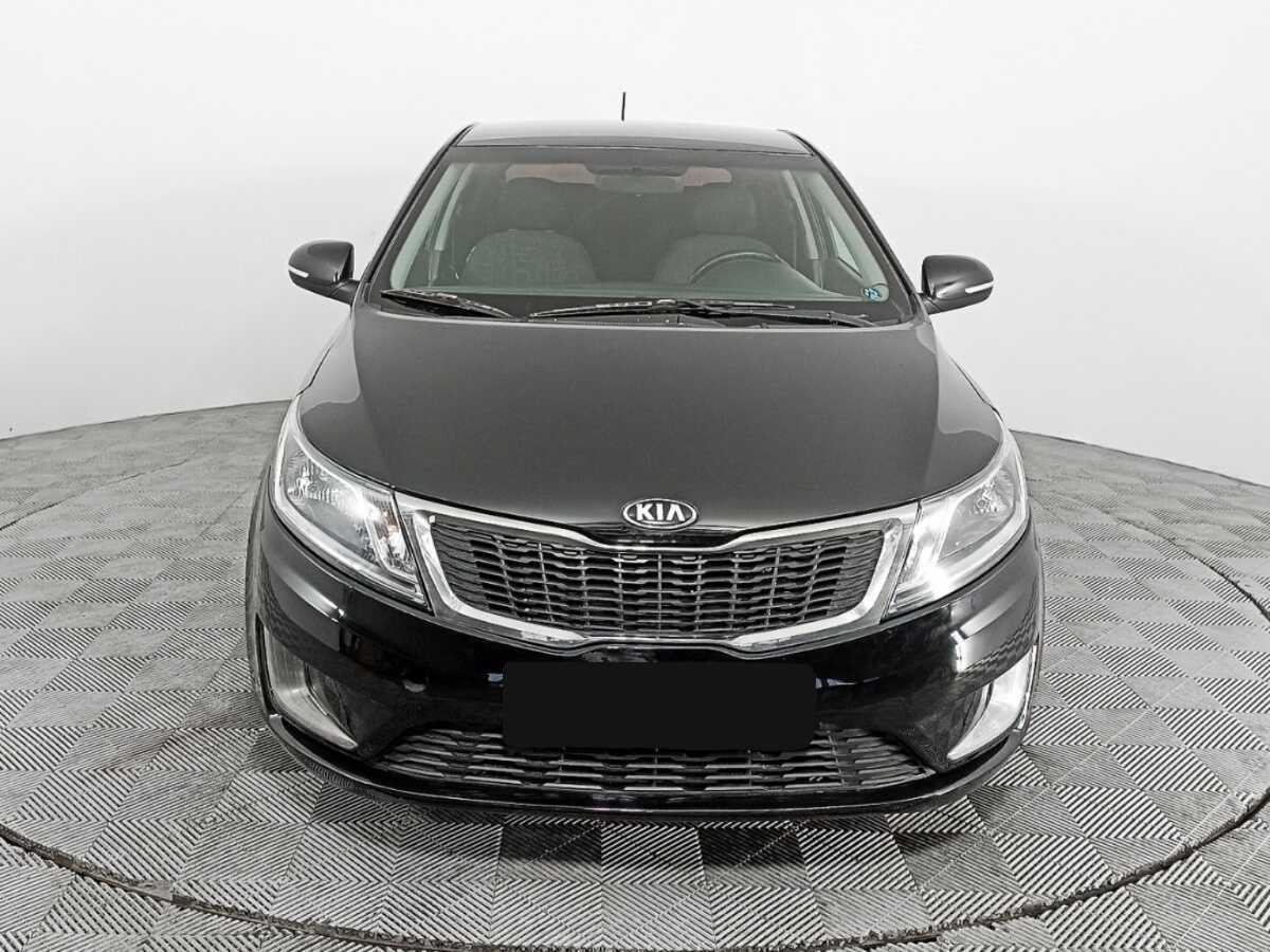Kia Rio с пробегом — 2015 год. Фото: #1