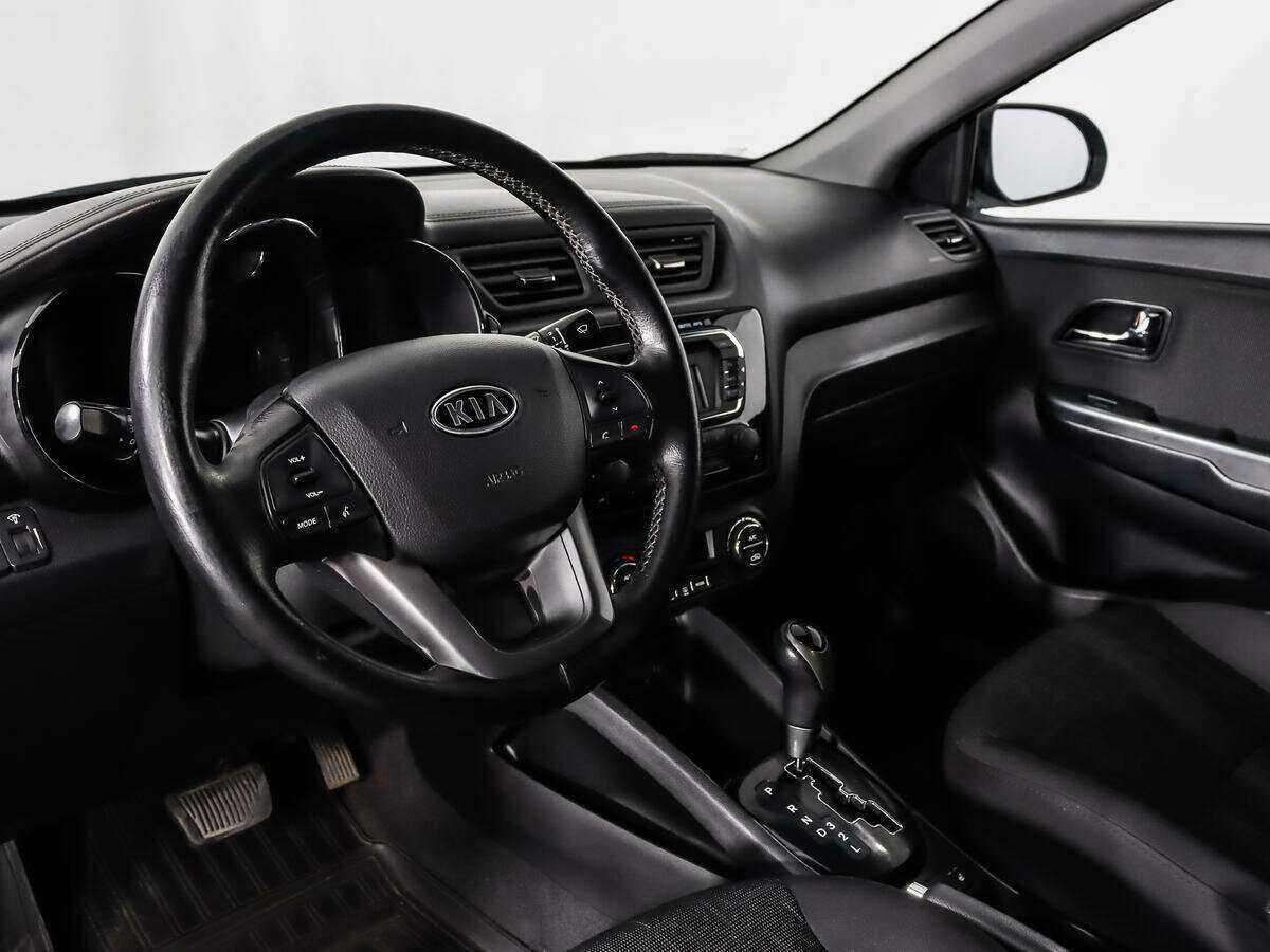 Kia Rio с пробегом — 2012 год. Фото: #7