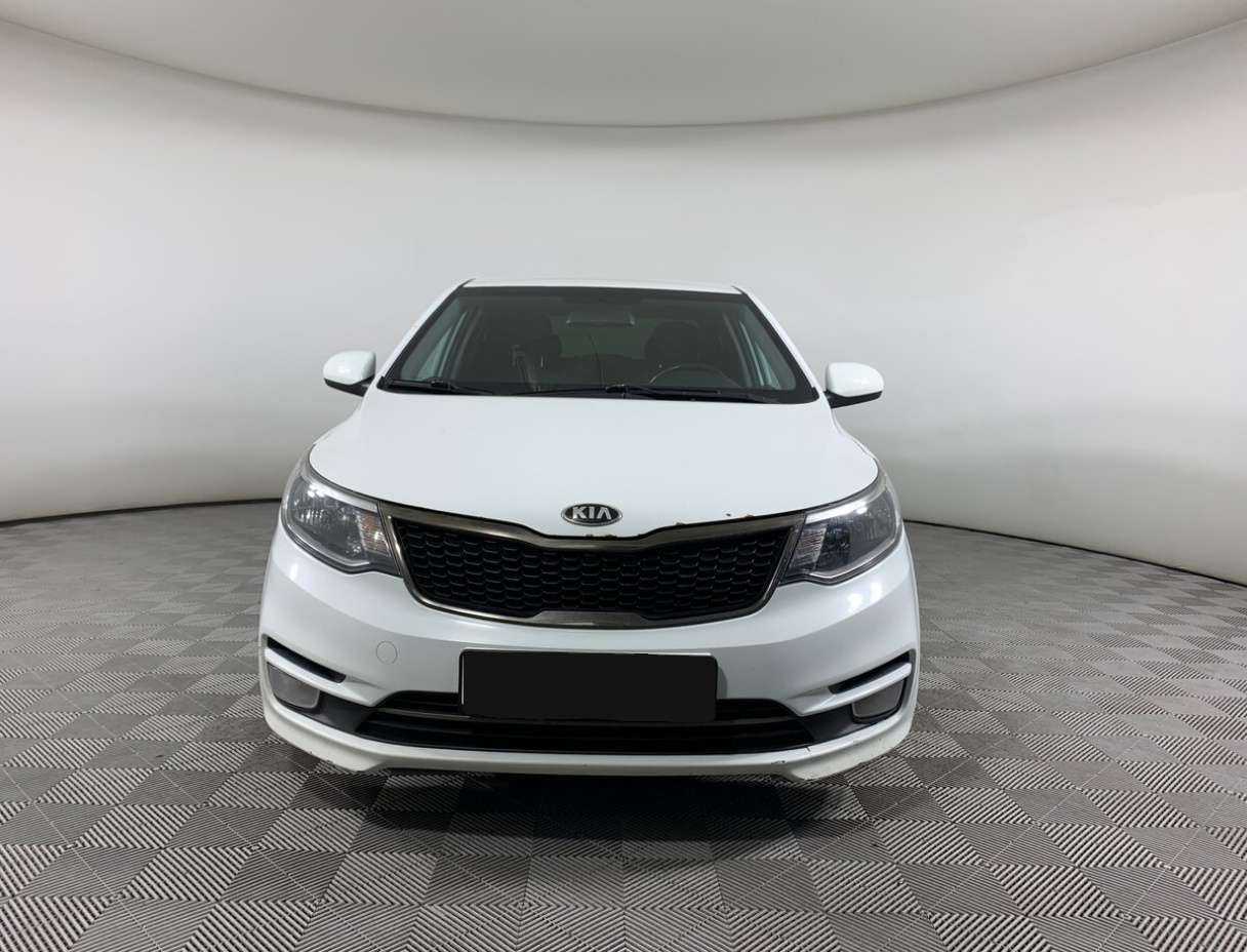 Kia Rio с пробегом — 2015 год. Фото: #1