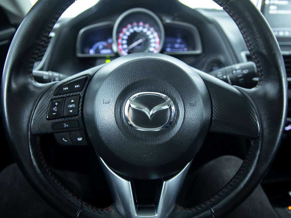 Mazda 3 с пробегом — 2014 год. Фото: #11