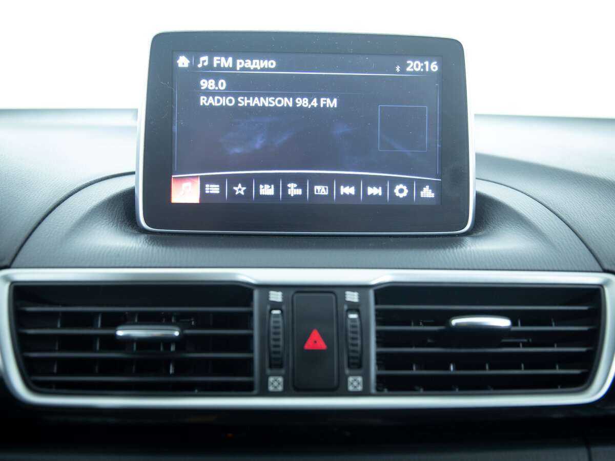 Mazda 3 с пробегом — 2014 год. Фото: #13