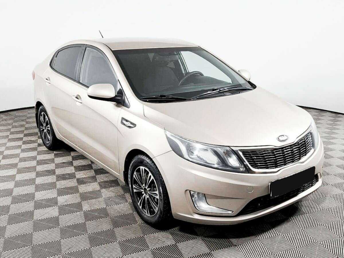 Kia Rio с пробегом — 2013 год. Фото: #2