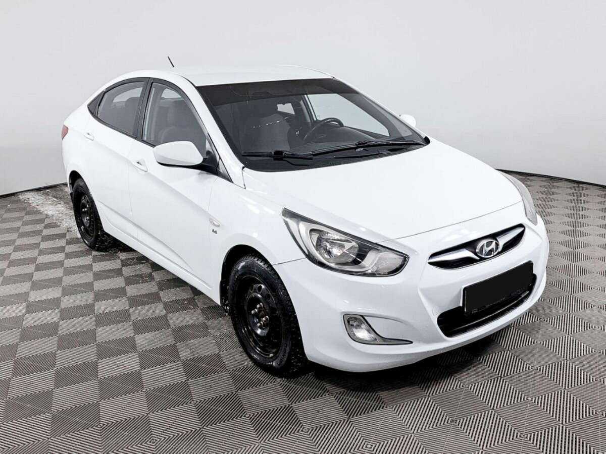 Hyundai Solaris с пробегом — 2013 год. Фото: #2