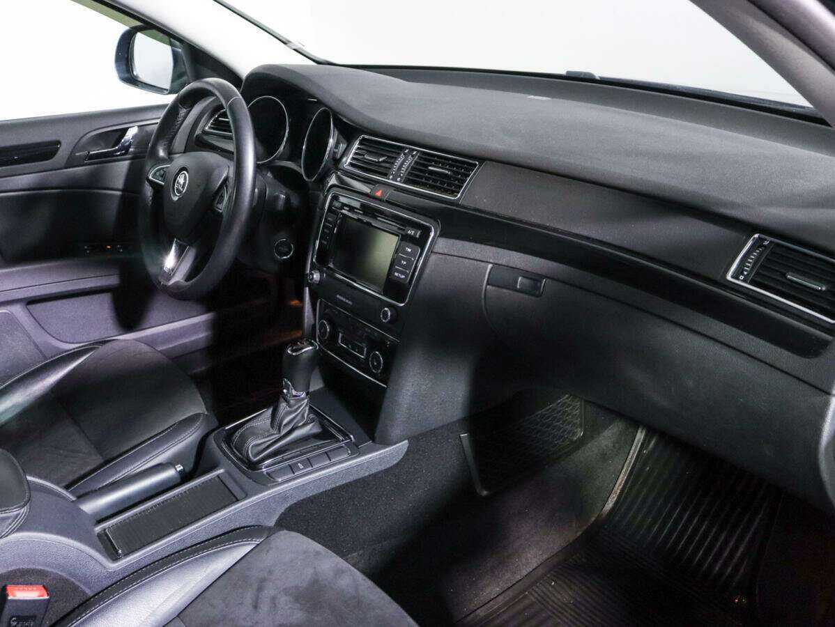 Skoda Superb с пробегом — 2013 год. Фото: #8
