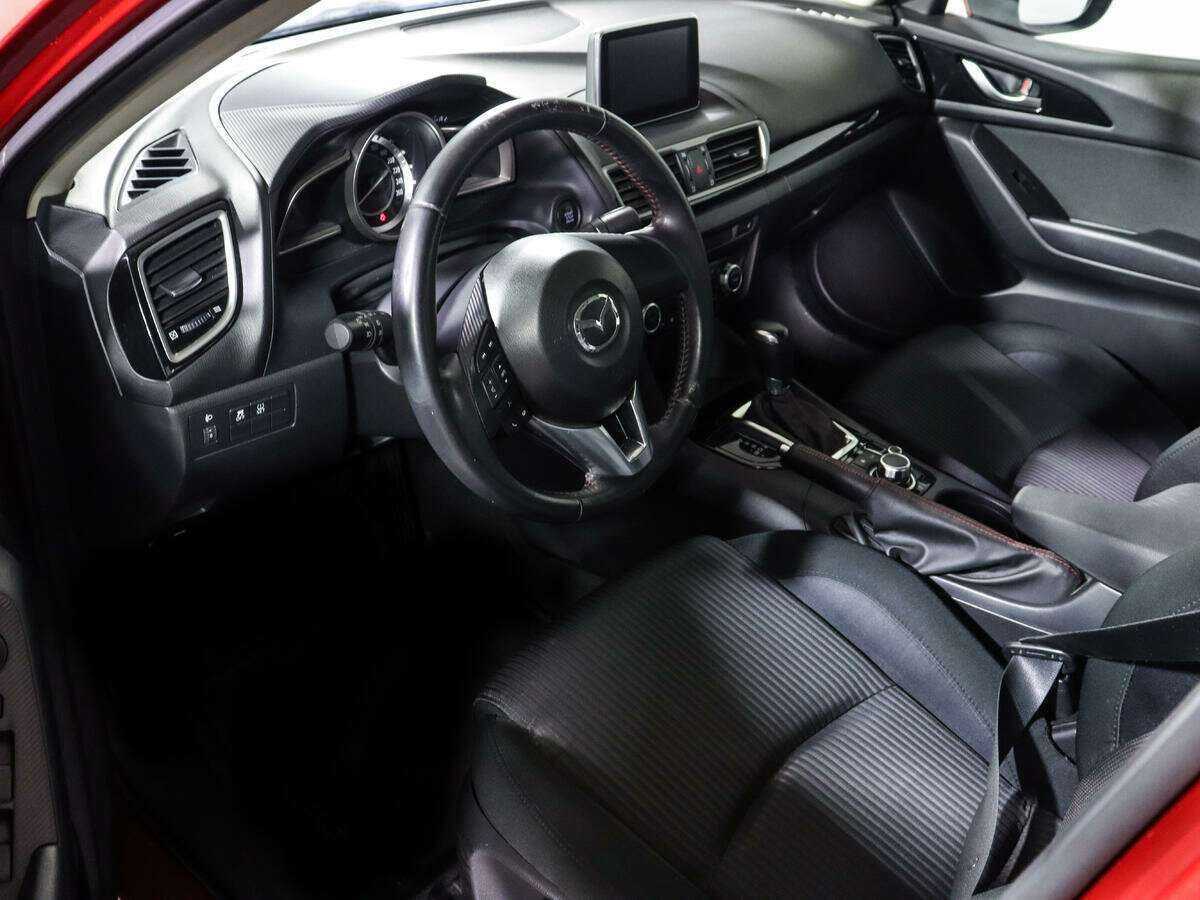 Mazda 3 с пробегом — 2014 год. Фото: #12
