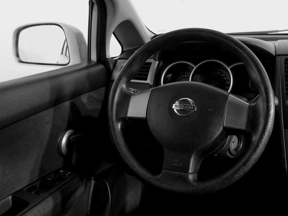 Nissan Tiida с пробегом — 2013 год. Фото: #12