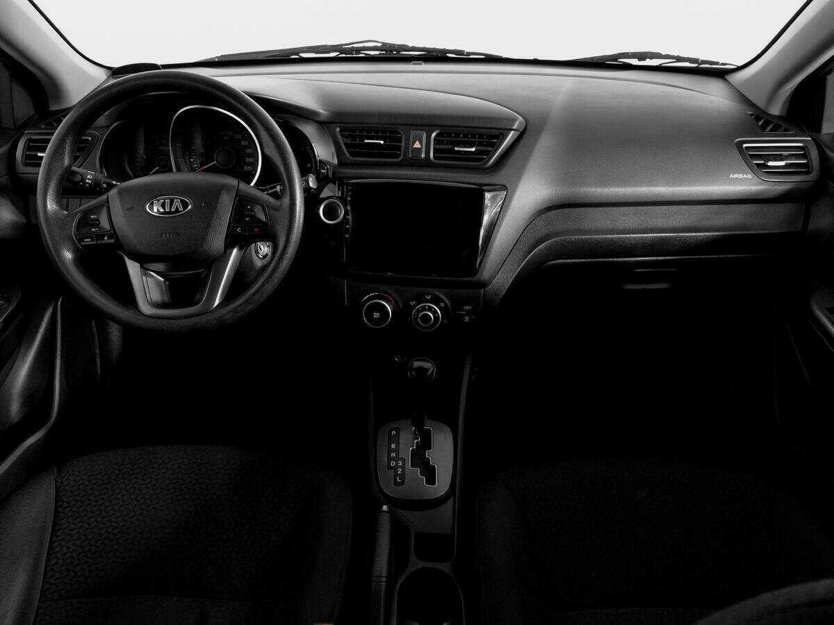 Kia Rio с пробегом — 2013 год. Фото: #11