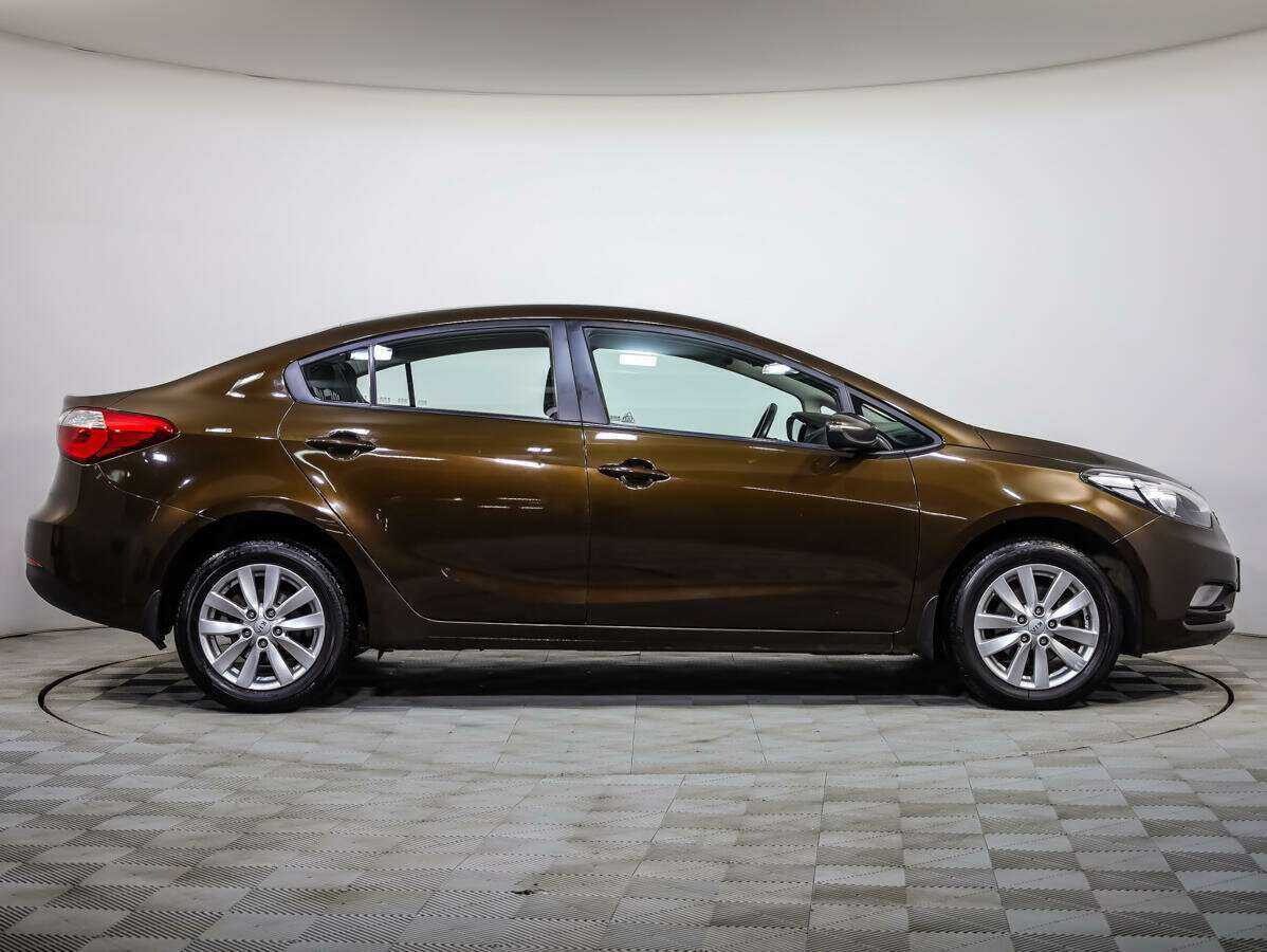 Kia Cerato с пробегом — 2015 год. Фото: #2