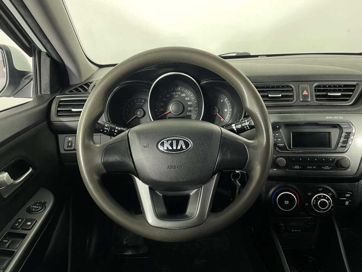 Kia Rio с пробегом — 2013 год. Фото: #9