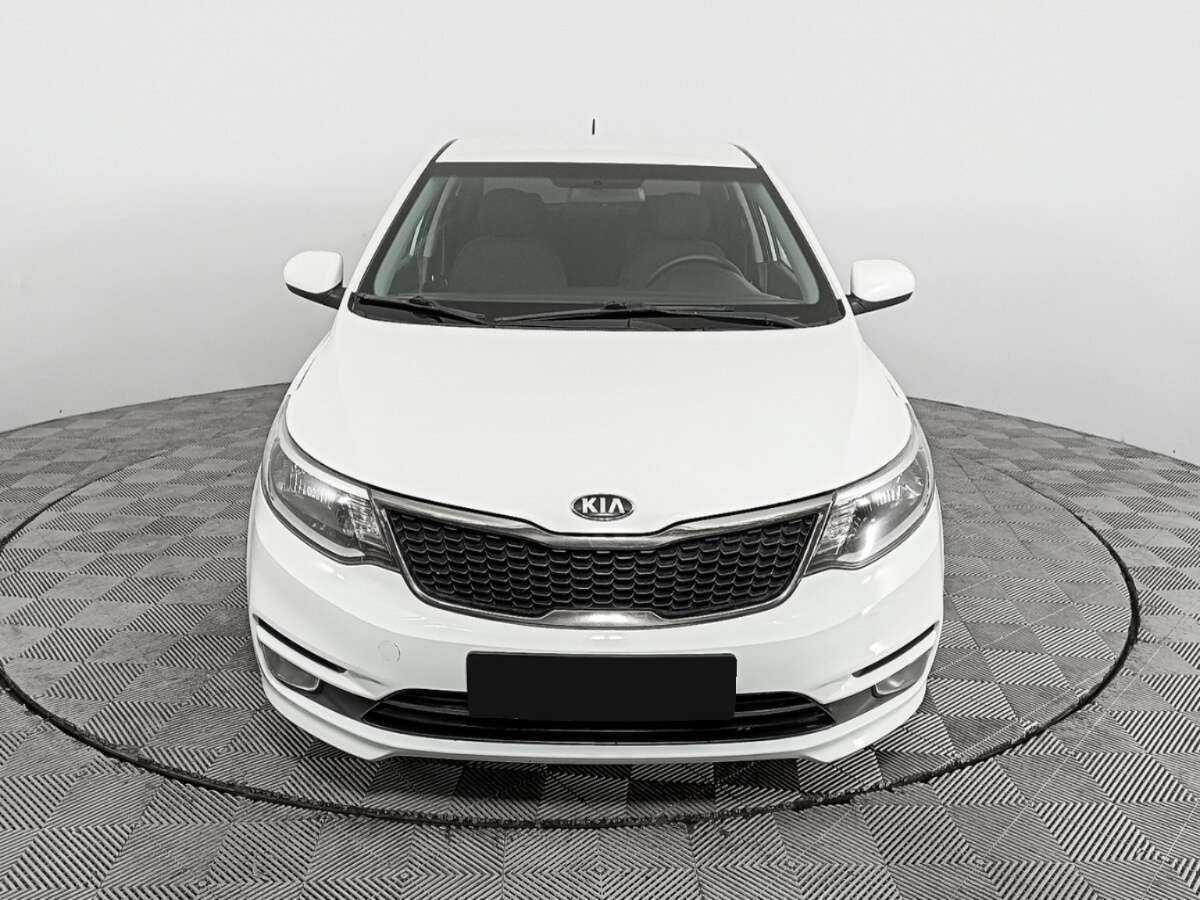 Kia Rio с пробегом — 2015 год. Фото: #1