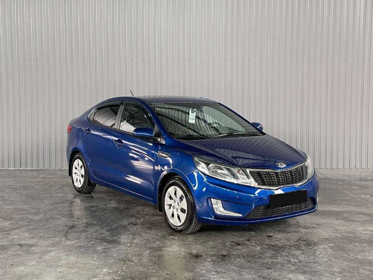 Kia Rio с пробегом — 2013 год. Фото: #2