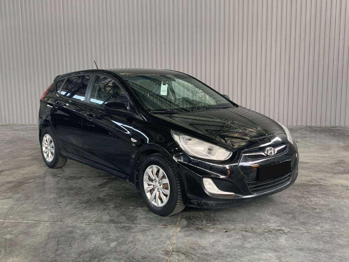 Hyundai Solaris с пробегом — 2012 год. Фото: #2