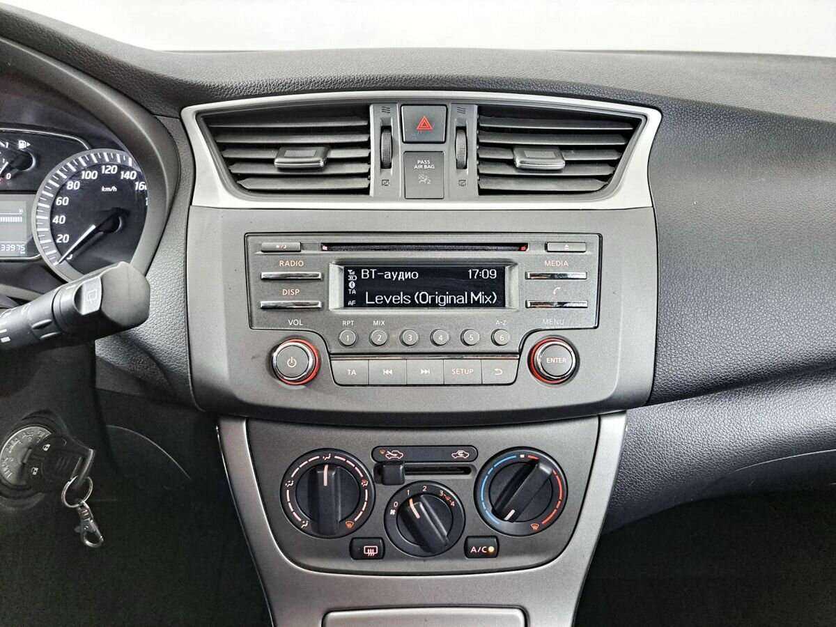 Nissan Tiida с пробегом — 2015 год. Фото: #12