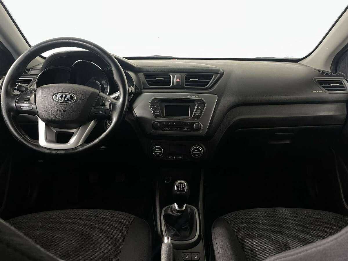 Kia Rio с пробегом — 2013 год. Фото: #6