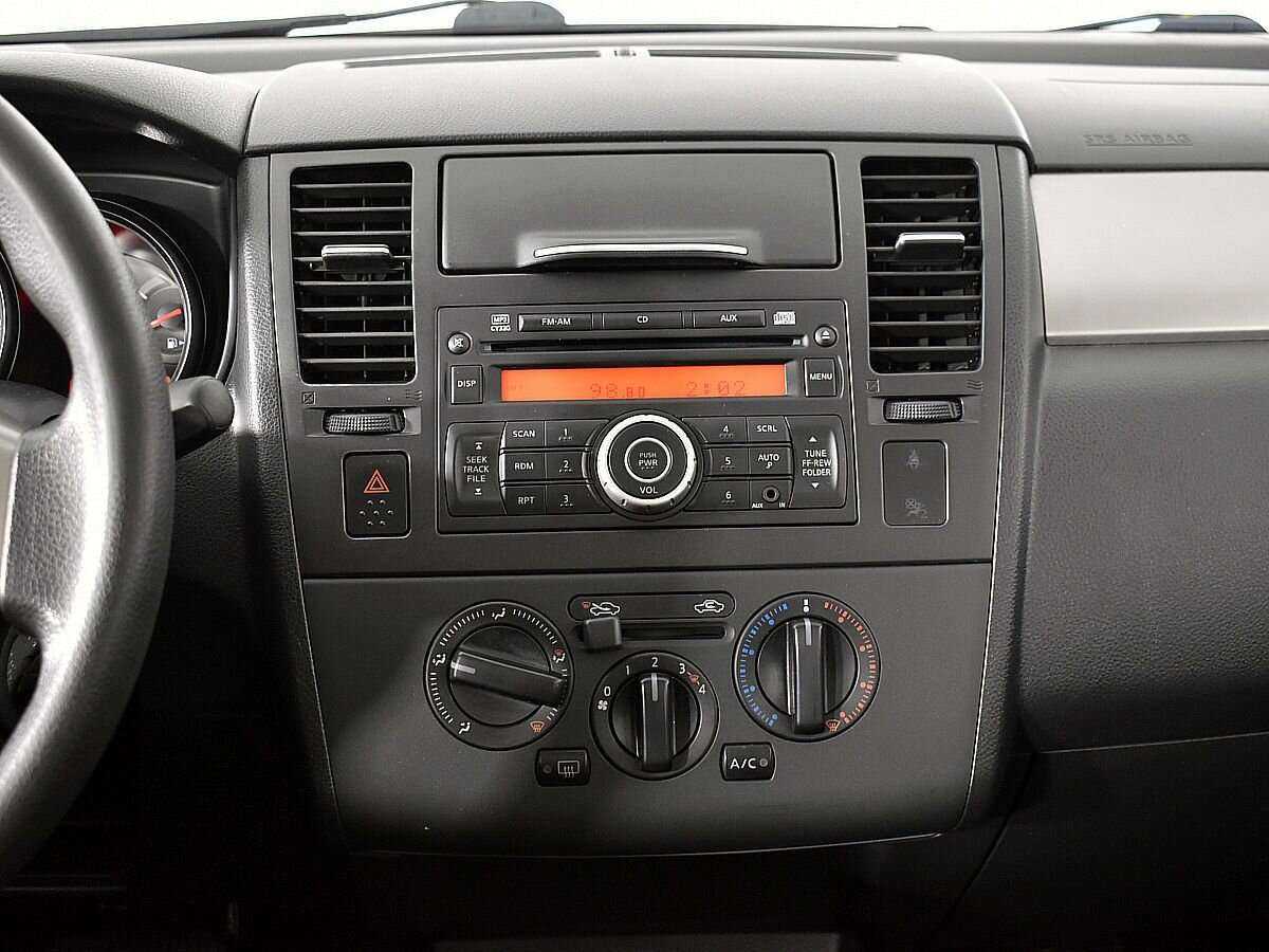 Nissan Tiida с пробегом — 2013 год. Фото: #12