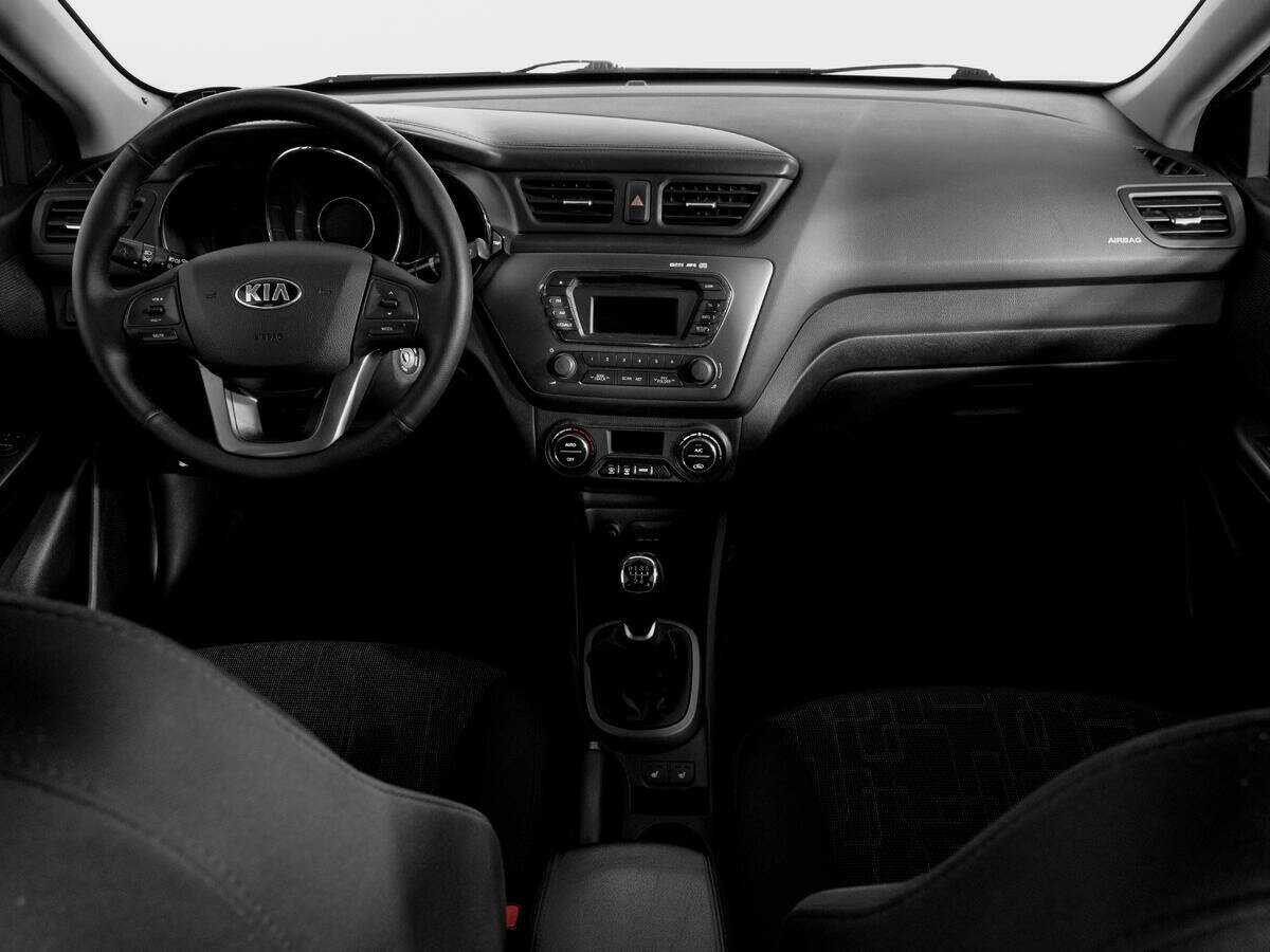 Kia Rio с пробегом — 2013 год. Фото: #11