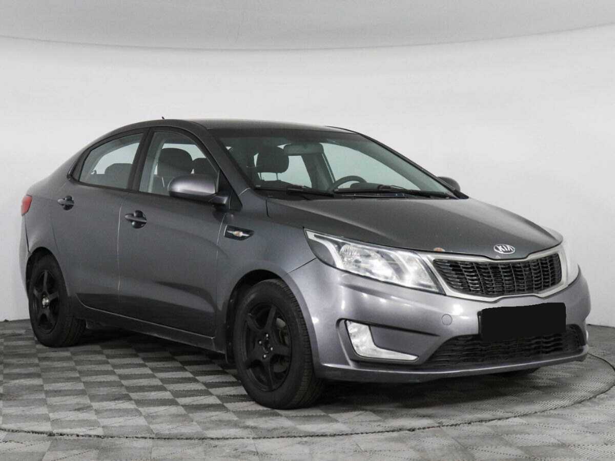 Kia Rio с пробегом — 2013 год. Фото: #2