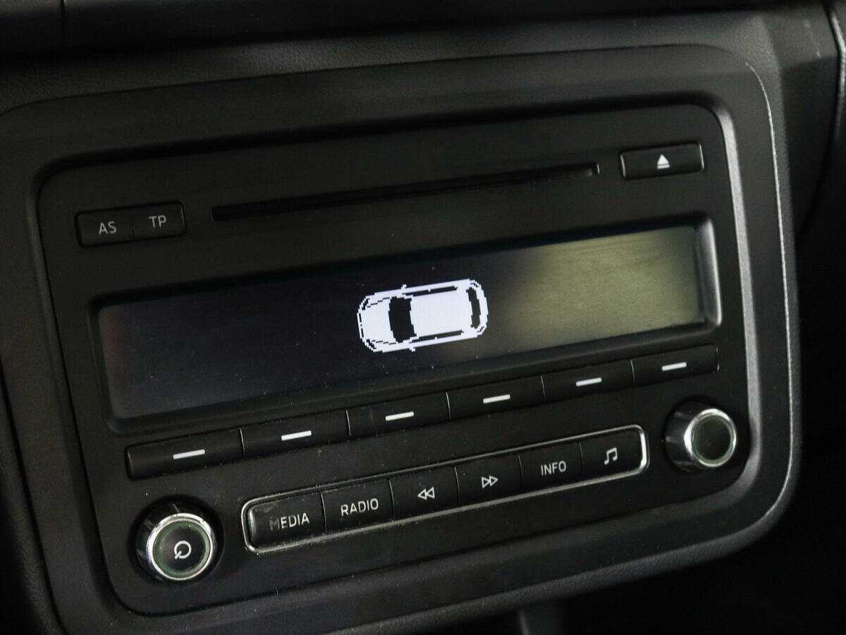 Skoda Fabia с пробегом — 2014 год. Фото: #13