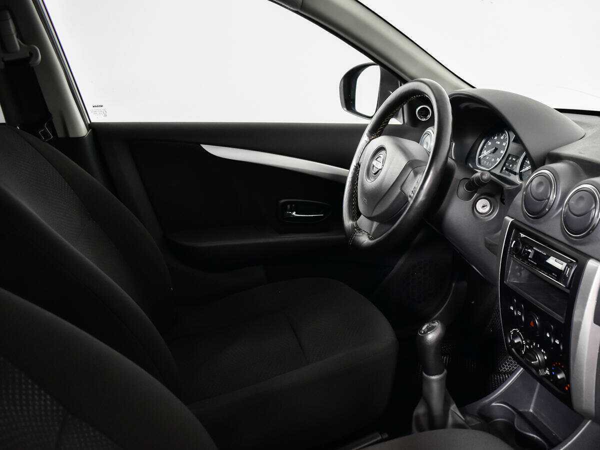 Nissan Almera с пробегом — 2013 год. Фото: #8