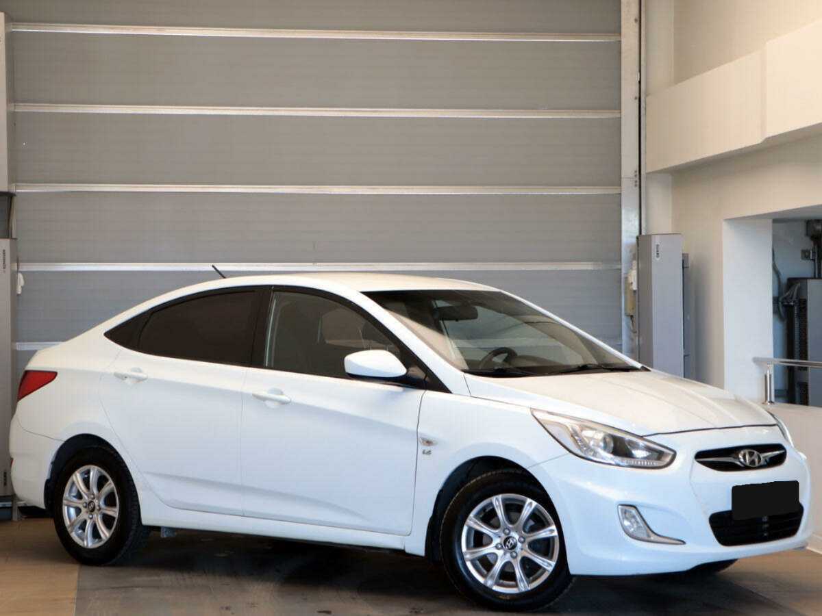 Hyundai Solaris с пробегом — 2013 год. Фото: #2