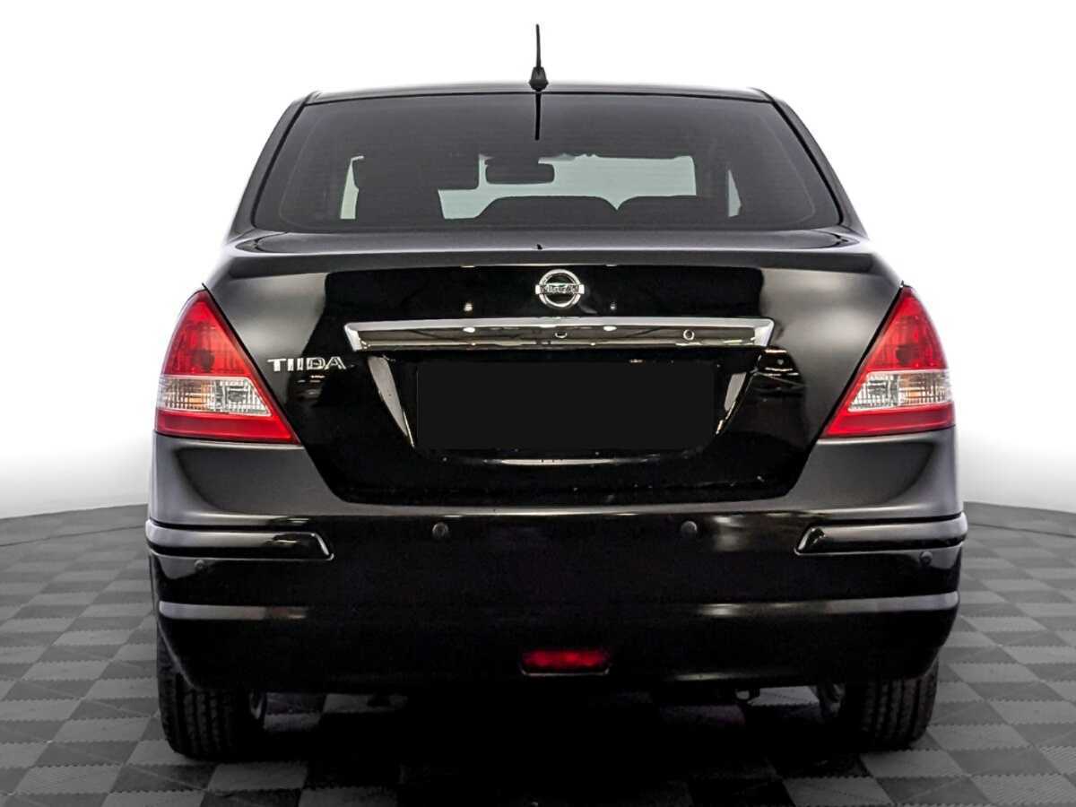 Nissan Tiida с пробегом — 2013 год. Фото: #5