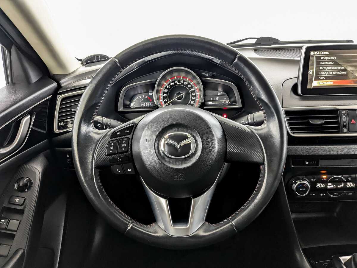 Mazda 3 с пробегом — 2014 год. Фото: #16