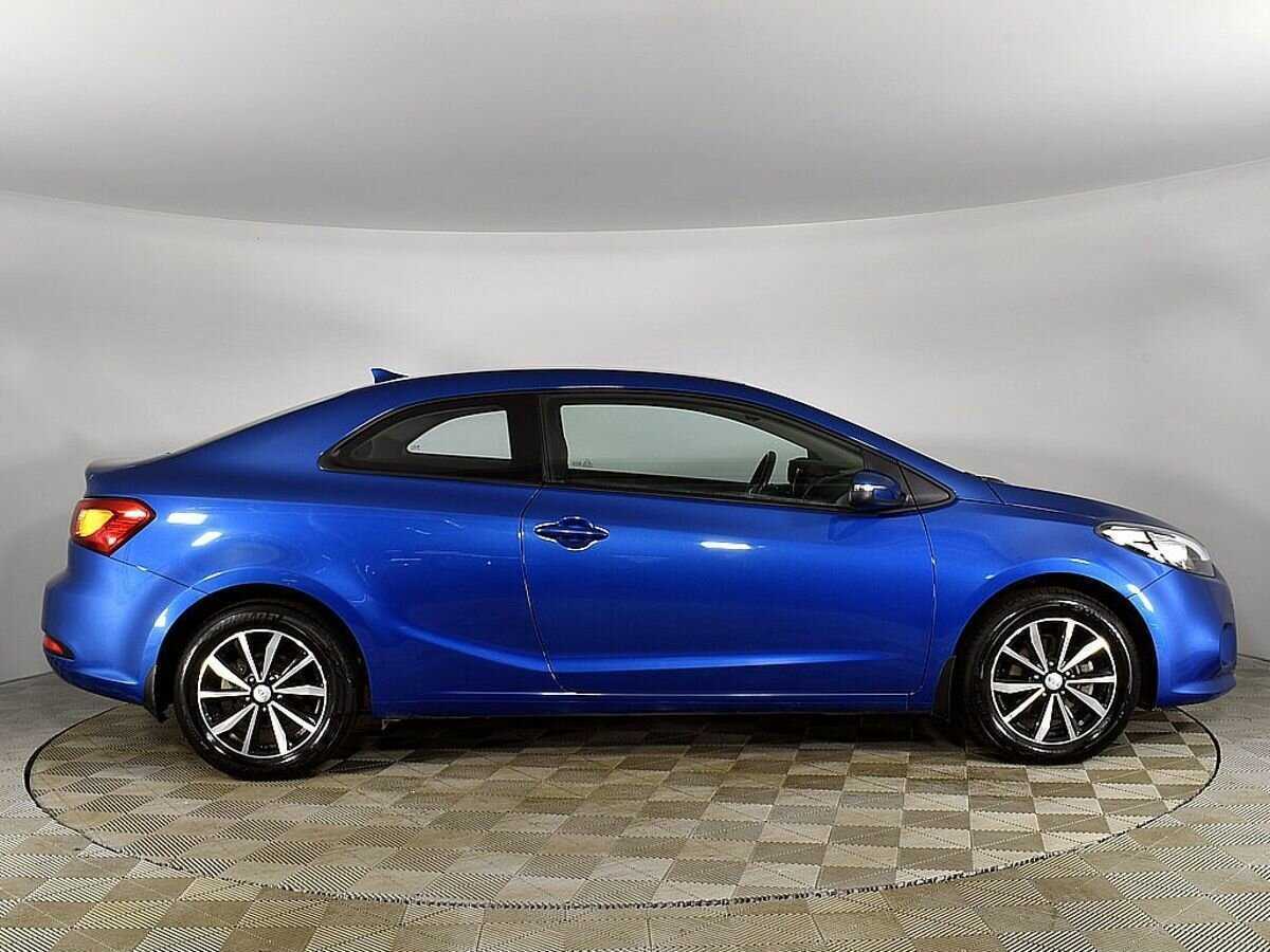 Kia Cerato с пробегом — 2013 год. Фото: #4