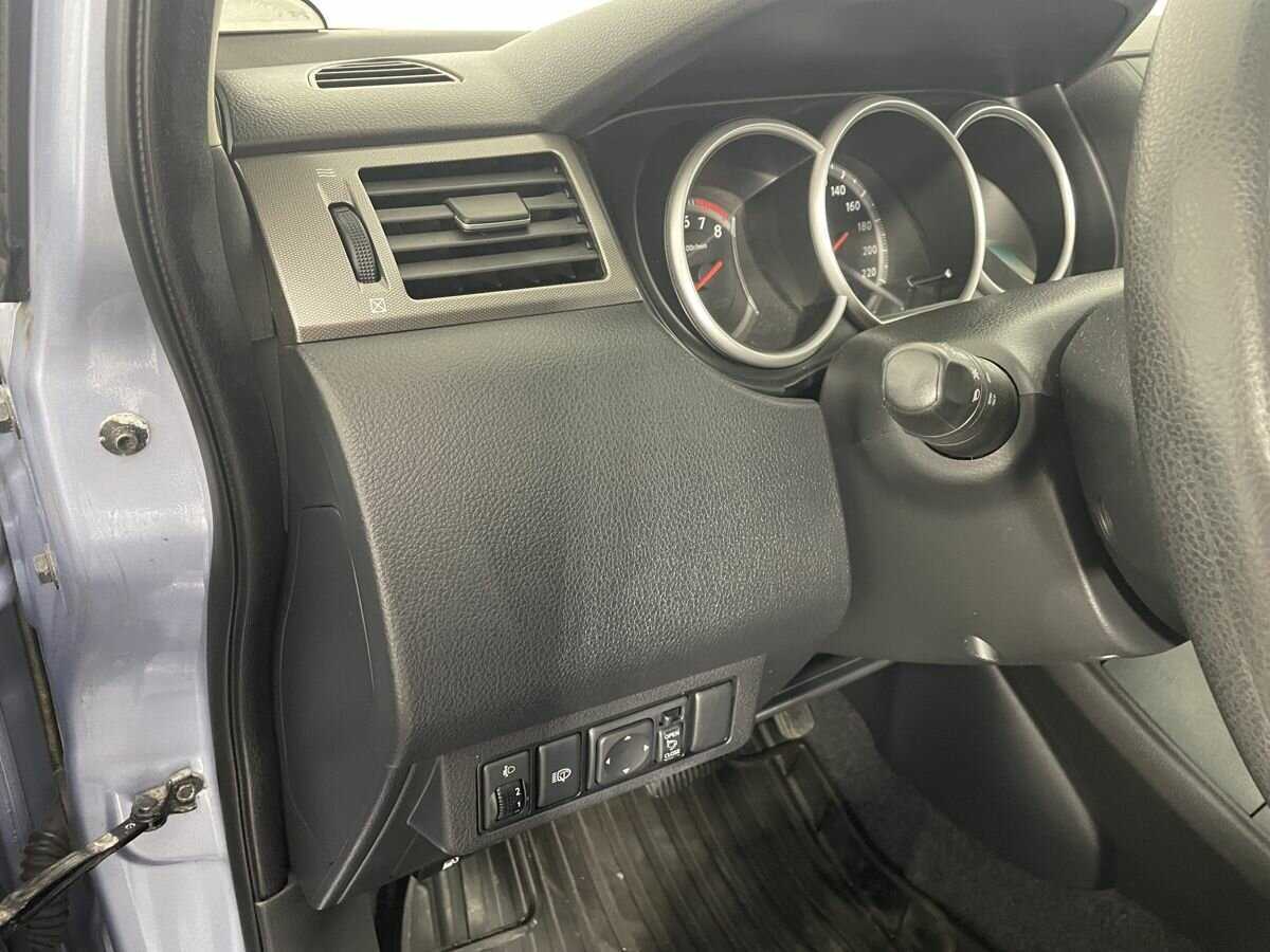 Nissan Tiida с пробегом — 2013 год. Фото: #8