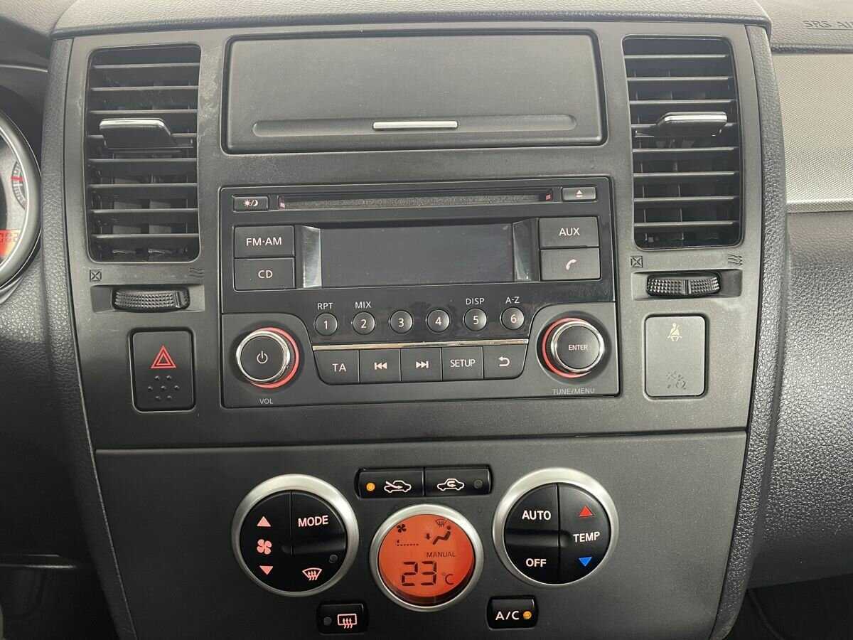 Nissan Tiida с пробегом — 2013 год. Фото: #11