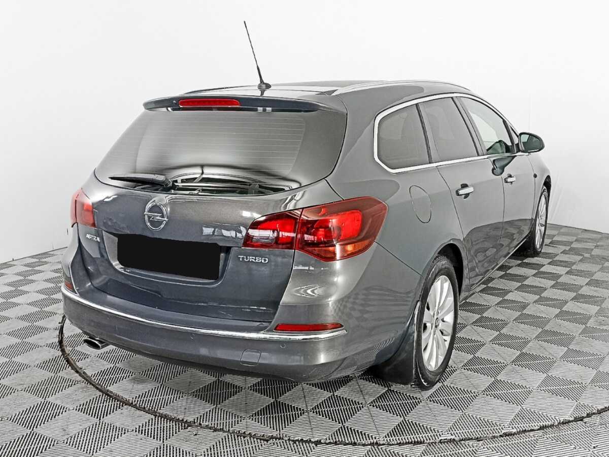 Opel Astra с пробегом — 2013 год. Фото: #4