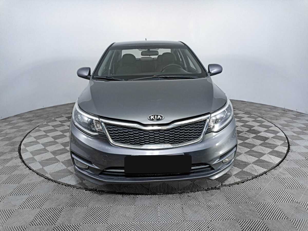 Kia Rio с пробегом — 2015 год. Фото: #1