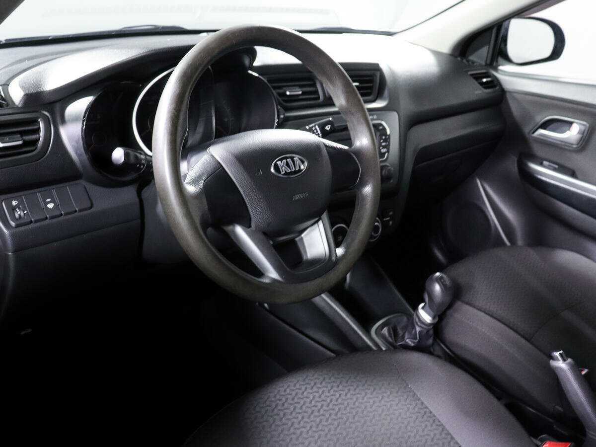 Kia Rio с пробегом — 2013 год. Фото: #10