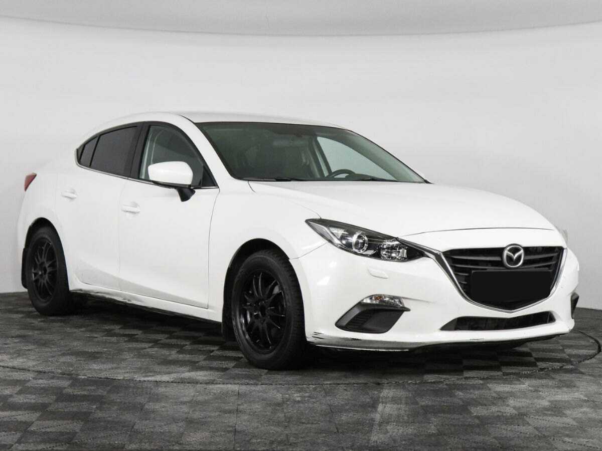 Mazda 3 с пробегом — 2013 год. Фото: #1