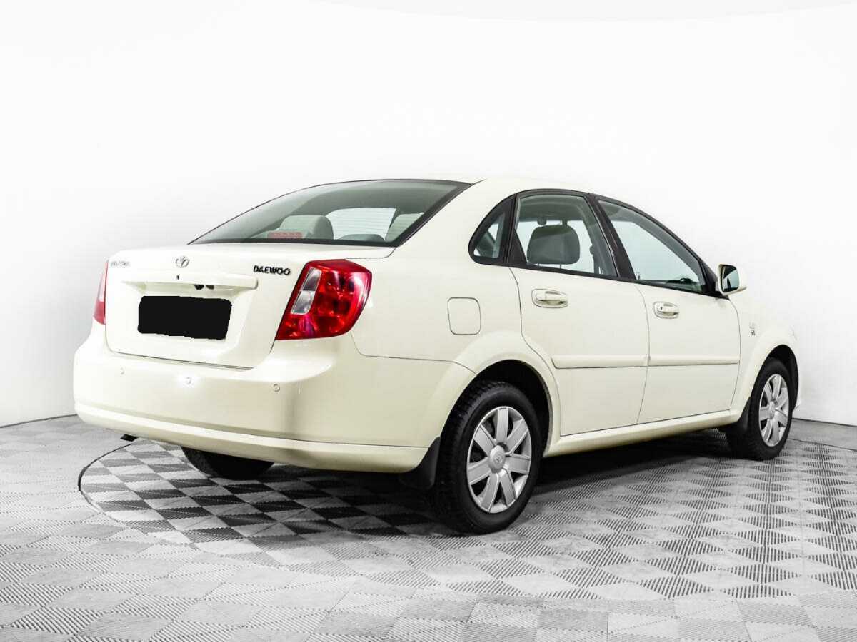 Daewoo Gentra с пробегом — 2014 год. Фото: #4