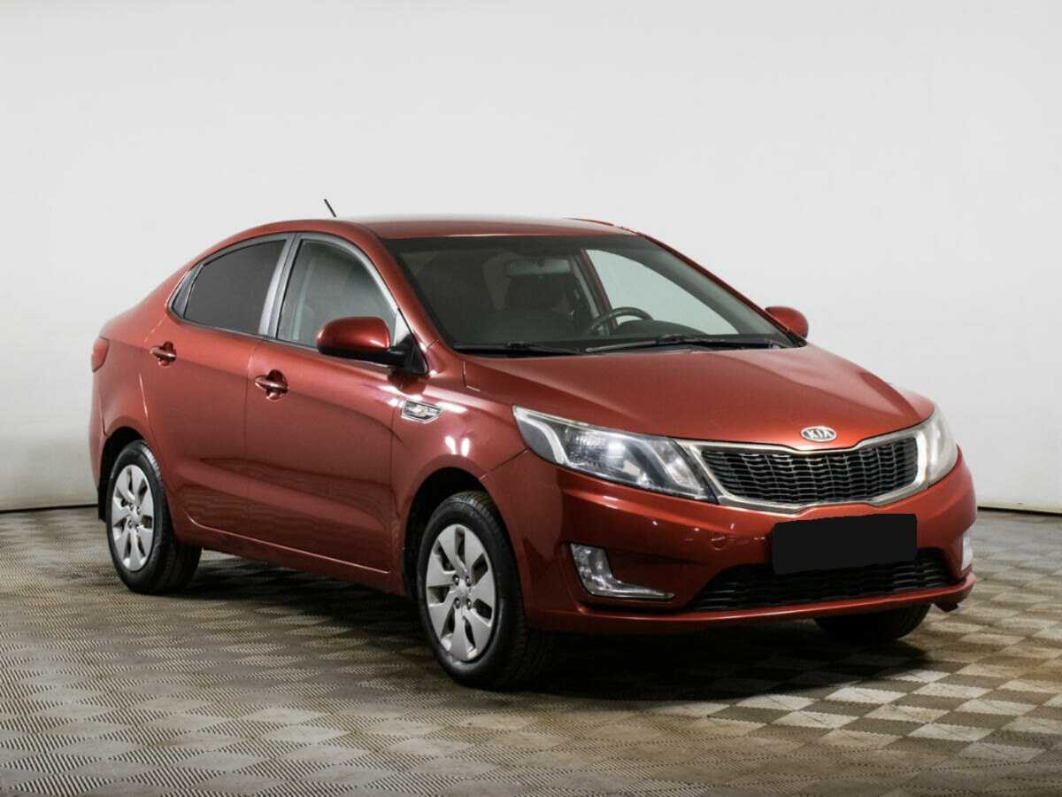Kia Rio с пробегом — 2012 год. Фото: #2