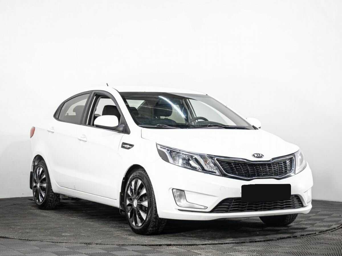 Kia Rio с пробегом — 2013 год. Фото: #2